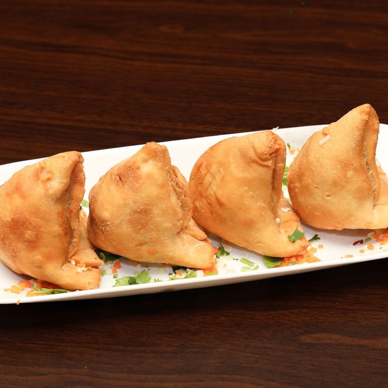 Savor Our Authentic Samosas